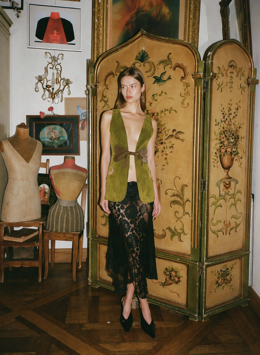 Basil, 70s olive green suede waistcoat with leather ties and handmade folk leather appliqué