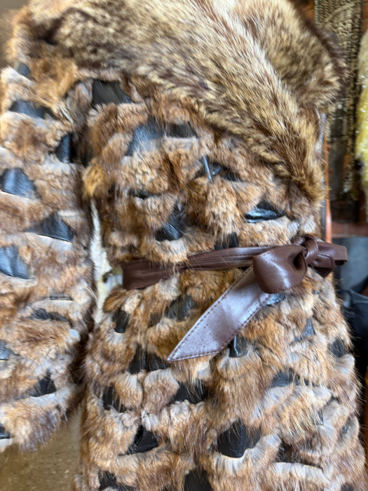 Macy’s 70s mixed leather and fur trench coat