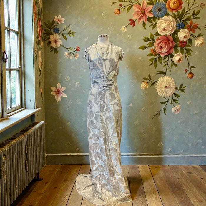 Monica, 20s silver floral lamé dress with bustle train