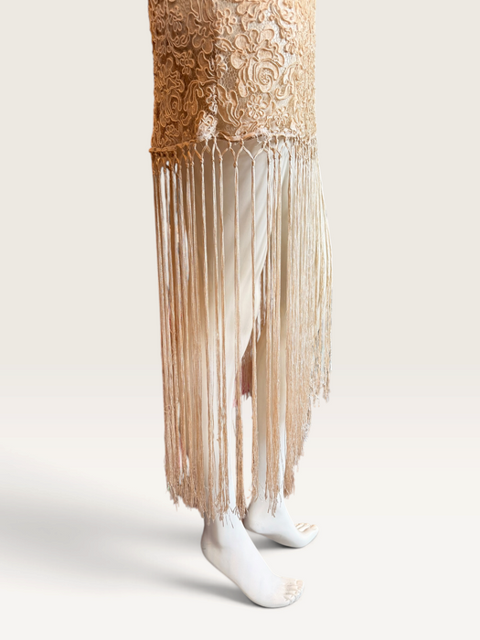 Odette, reworked 1940s cream lace fringed mini dress with 20s black jet beaded keyhole design.