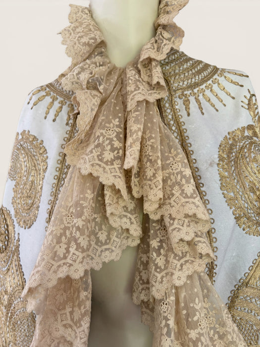 Shay, Ottoman cream and gold embroidered cape with cream lace ruffle collar