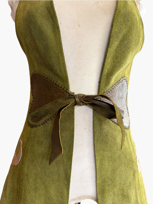 Basil, 70s olive green suede waistcoat with leather ties and handmade folk leather appliqué