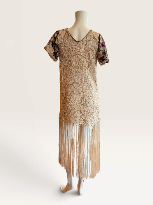 Odette, reworked 1940s cream lace fringed mini dress with 20s black jet beaded keyhole design.