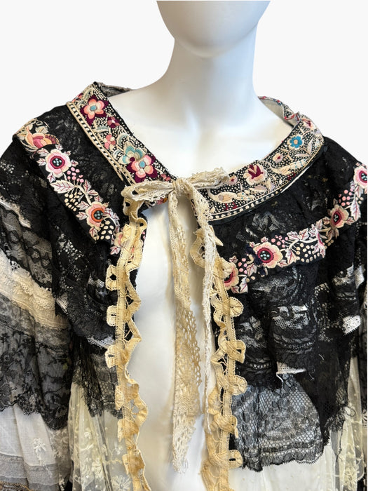 Moldova, reworked antique lace and embroidered ribbon coat