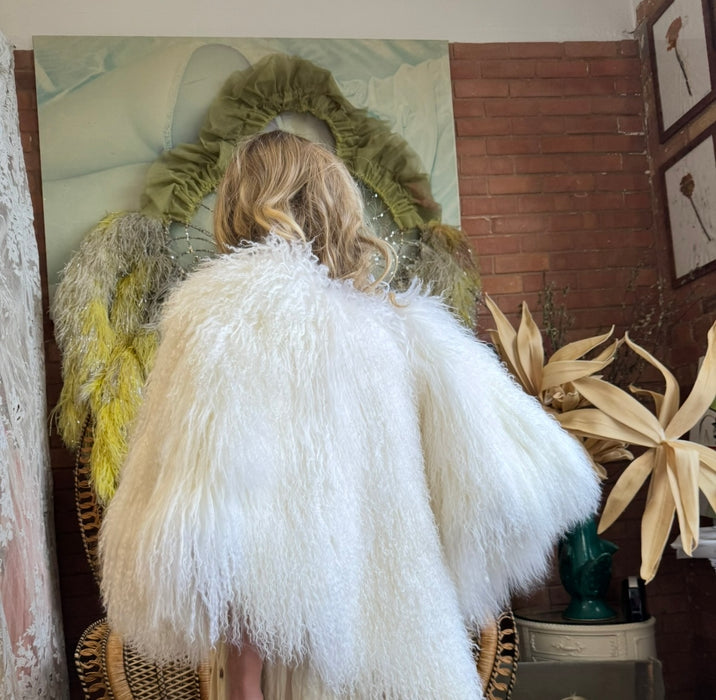 Magnolia, 80s Mongolian fur cream cape with 3 leather ties