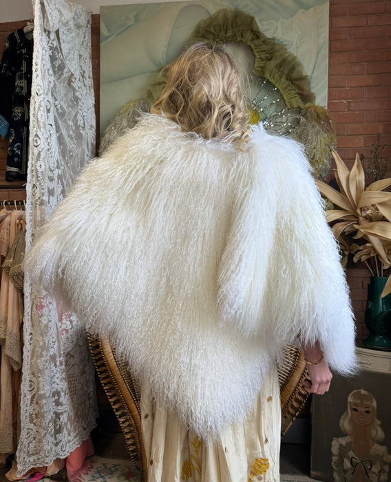 Magnolia, 80s Mongolian fur cream cape with 3 leather ties
