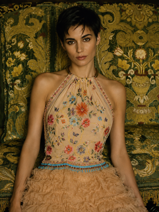 Kali, reworked embroidered piano shawl dress with brass choker and 20s sheered metallic skirt