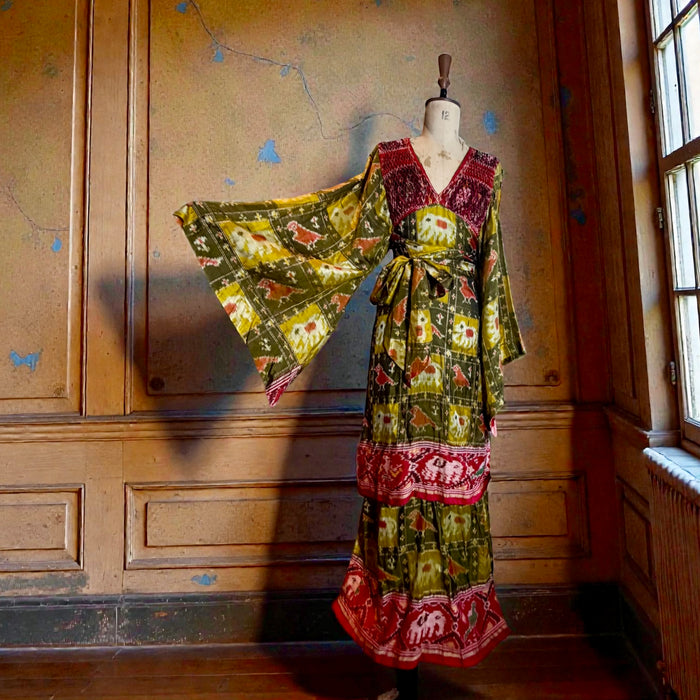 Thea Porter, Couture 70s silk print angel sleeve tiered dress