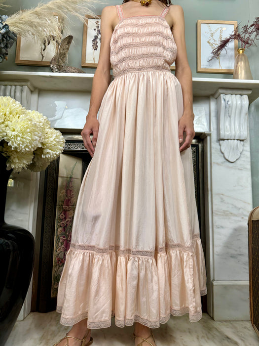 Janet Reiger, blush pink silk and lace dress