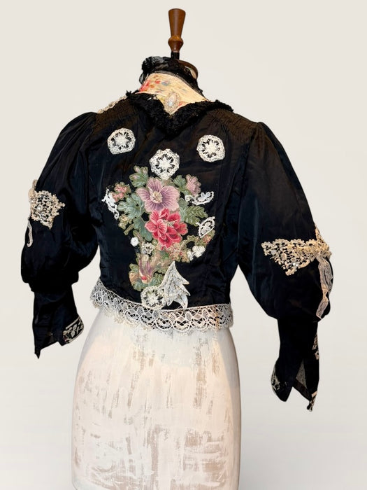 Kiki, Victorian black silk jacket with mutton sleeves, embellished with beaded lace