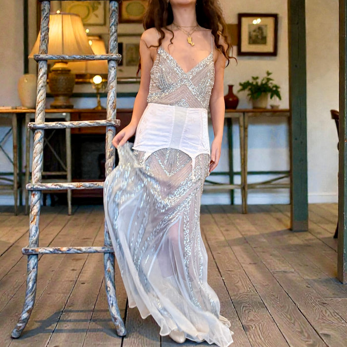 Tara, a 90s iridescent sequins and tulle dress.