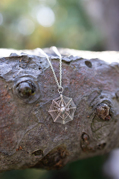 Lane, Victorian silver spiderweb charm on a silver chain