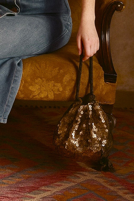Aida, 20s gold sequence and black cord bucket handbag