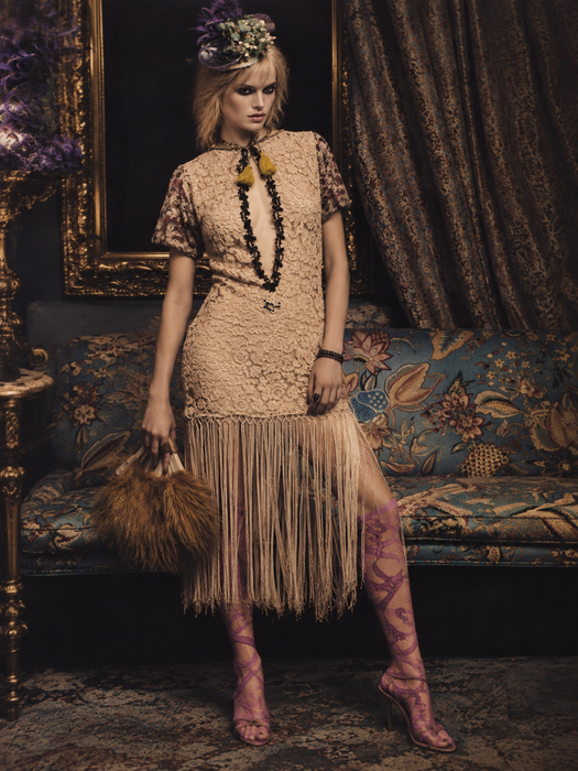 Odette, reworked 1940s cream lace fringed mini dress with 20s black jet beaded keyhole design.