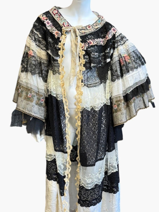 Moldova, reworked antique lace and embroidered ribbon coat