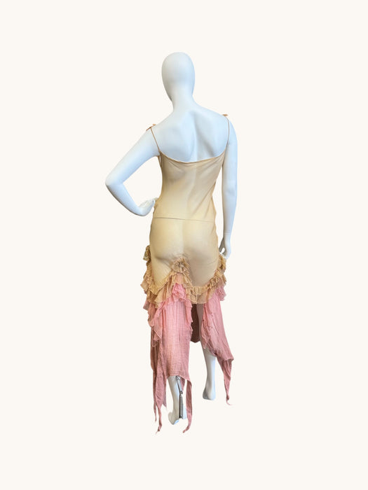 Laine, bias cut silk chiffon and pink dyed handkerchief dress with rosettes