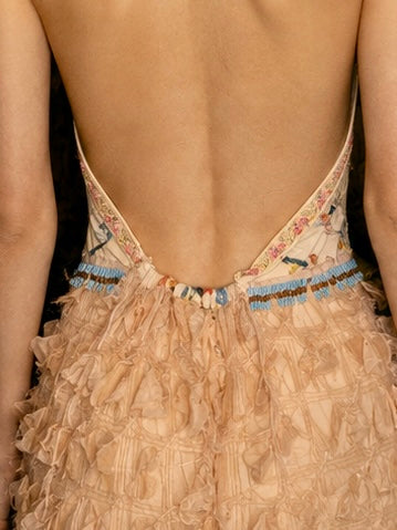 Kali, reworked embroidered piano shawl dress with brass choker and 20s sheered metallic skirt