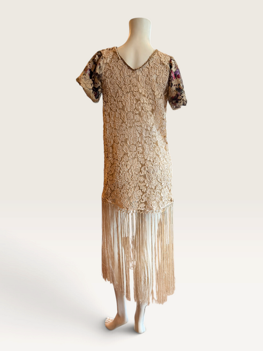 Odette, reworked 1940s cream lace fringed mini dress with 20s black jet beaded keyhole design.