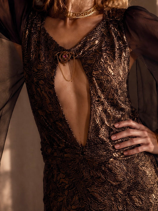 Freja, 1930s black and gold lamé gown with chiffon angel sleeves