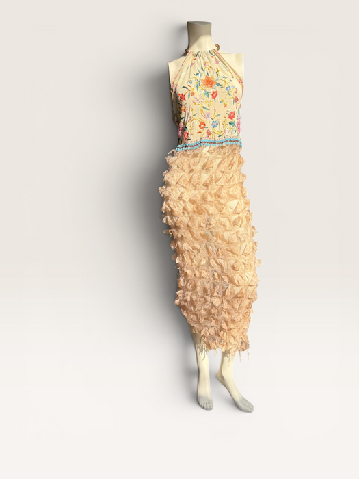Kali, reworked embroidered piano shawl dress with brass choker and 20s sheered metallic skirt