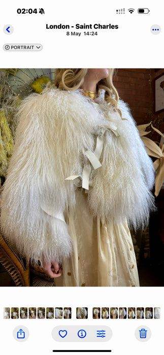 Magnolia, 80s Mongolian fur cream cape with 3 leather ties
