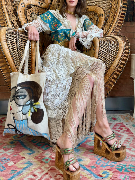 Joyce, reworked antique lace and needlepoint coat