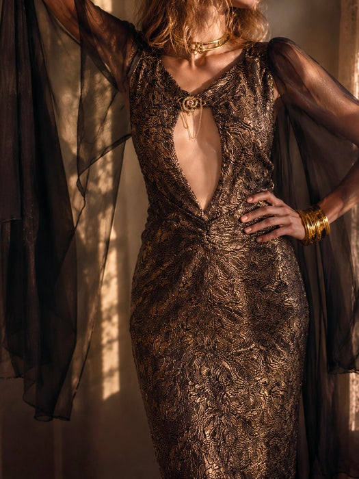 Freja, 1930s black and gold lamé gown with chiffon angel sleeves