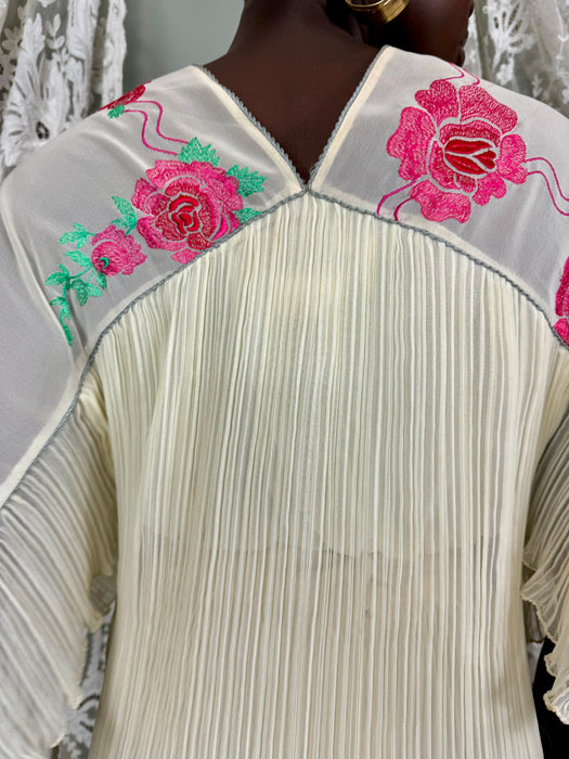 Janice Wainwright, 70s floral pleated blouse and skirt