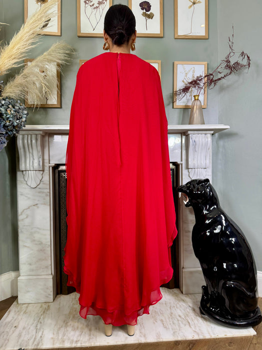 Carolina Herrera, red silk dress with chiffon cape