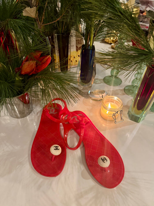 Chanel, red plastic logo flip flops