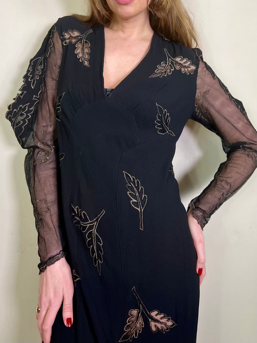 Carrie, 40s black crepe dress with leaf cut-outs