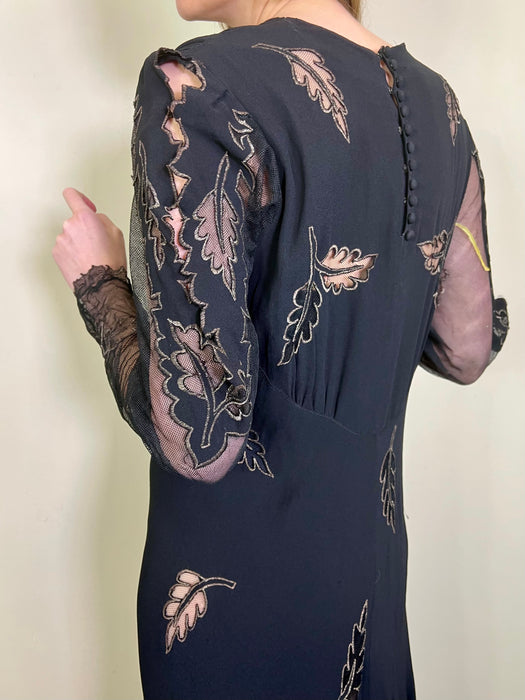 Carrie, 40s black crepe dress with leaf cut-outs