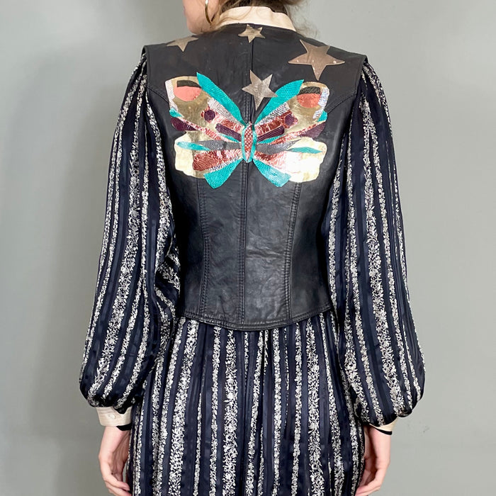 Clothilde, 70s leather black waistcoat with butterfly applique
